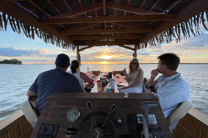 a group of people sitting at a table